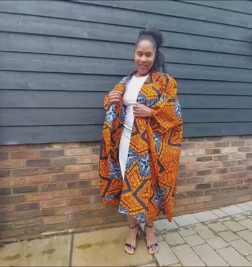 Load video: Bolama Orange Kimono